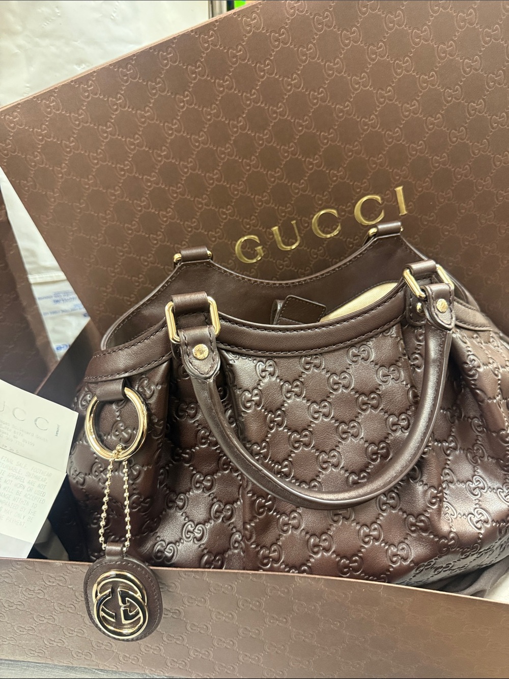 Brand New !  Authentic GUCCI Guccissima Sukey Brown Leather Handbag .